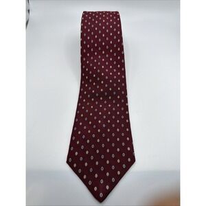 Bill Blass silk tie with a small geometric pattern in burgundy. 55''